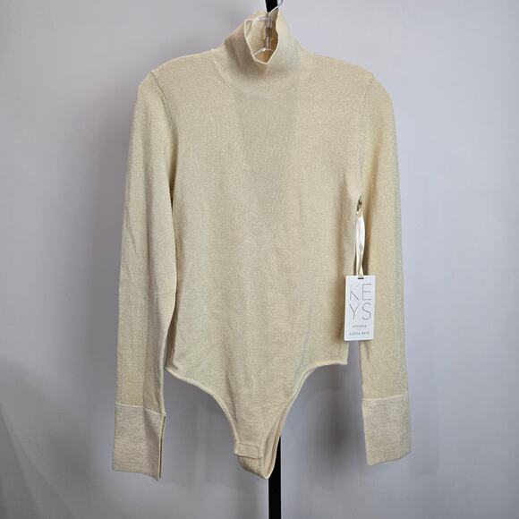 NWT Athleta Alicia Keys Long Sleeve Turtleneck Bodysuit Sparkly Cream Gold Small - Picture 1 of 6